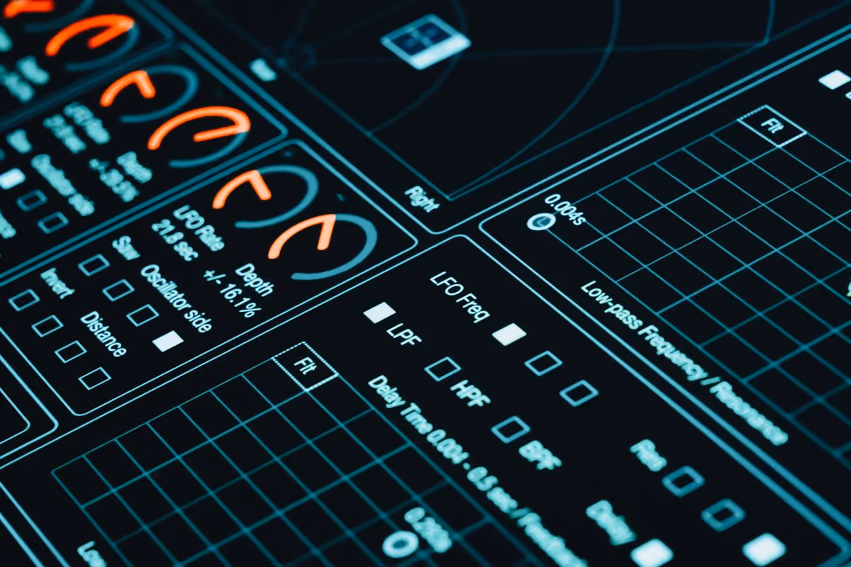 Close-up of a glowing digital control panel with dials and settings