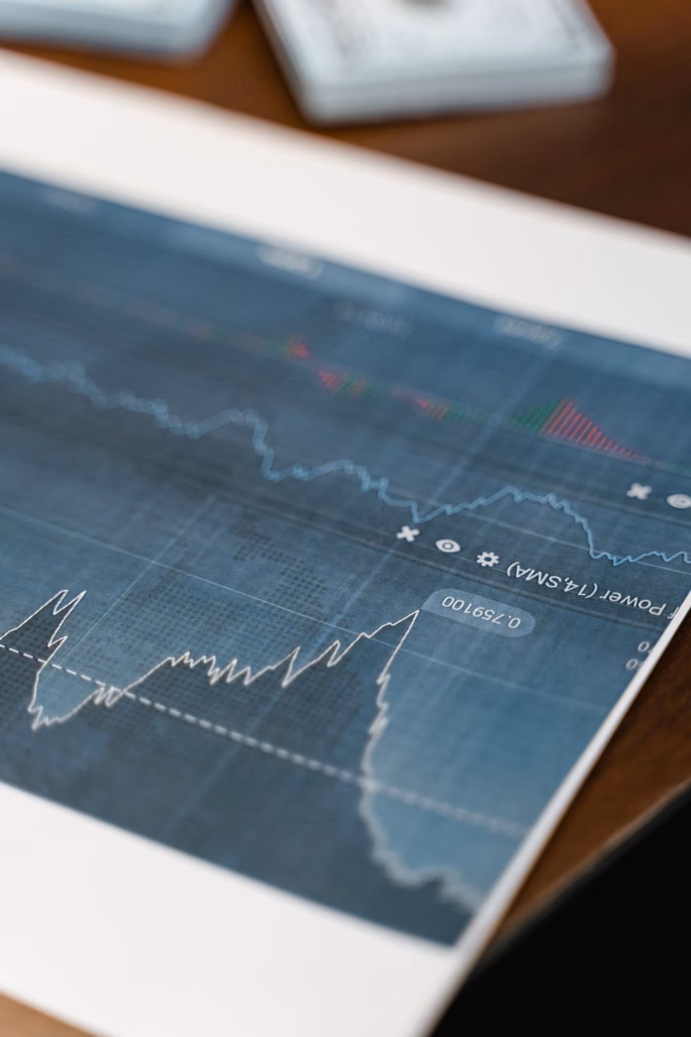 Printed line chart of market data on a desk