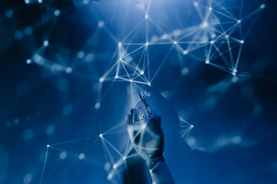 Robotic hand touching a glowing blue network of connected points